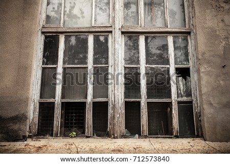 A window with a broken window pane. Broken glass. Background