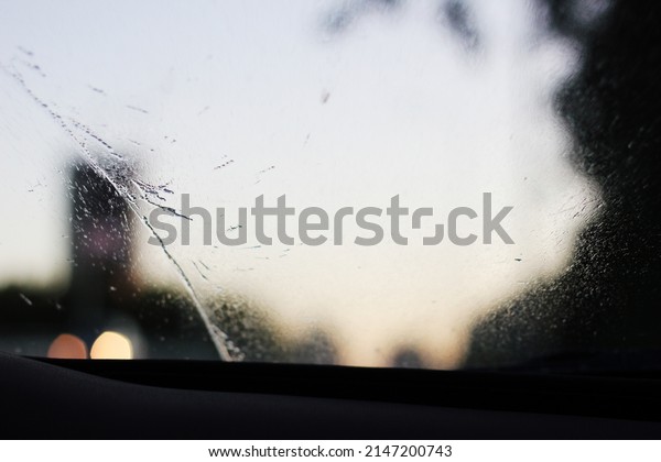 a window of a car at a
rainy day