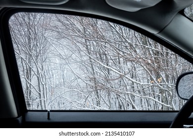 Window Car View Of Snow And Winter Trees In Pelion Mountain In Greece.