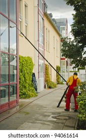 A Window Cleaner When Cleaning An Office Building