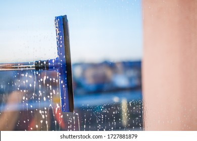 Window Cleaning Brush. Large Window In A Multi-storey Building, Cleaning Service. Window Cleaning In High-rise Buildings, Houses With A Brush. Dust Removal And Glass Washing.