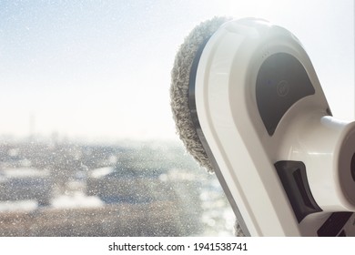 Window Cleaning Robot On Dirty Window, Sunlight