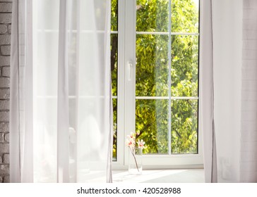 Window With Curtains
