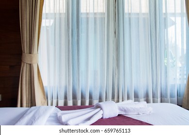 Window with curtains window or curtain blind pattern by the bed, interior decoration concept. - Powered by Shutterstock