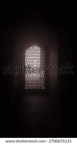 Window of the dark room inside the Tomb