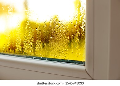 Window Drip Due To Bad Ventilation Inside House. Condensation On Glass During Cold Weather. High Humidity Is Cause Of Mold (mildew, Mould) On House Or Building Surfaces. Water Drop Tracks On Windows. 