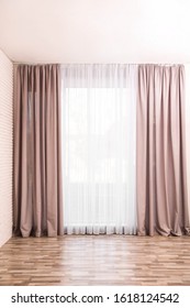 Window with elegant curtains in empty room - Shutterstock ID 1618124542