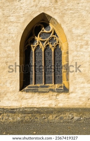 The window of the Herford Minster Church is a late Romanesque hall church that was built around 1220–1250 for the Herford Abbey. It is one of the earliest hall churches in Germany