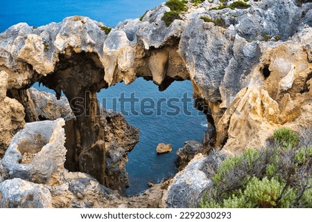 The Window, an impressive limestone rock formation giving a view of the Southern Ocean in D’Entrecasteaux National Park, close to Windy Harbour, Western Australia

