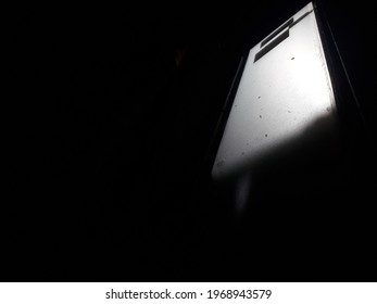 a window lit from the outside.