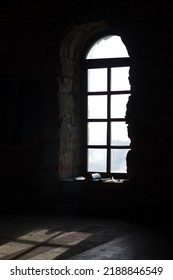 Window Of An Old Church.  Light Passes Through The Window.  Shadow And Light