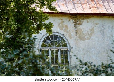 A window of an old medieval protestant church, Estonia. High quality photo. Selective focus