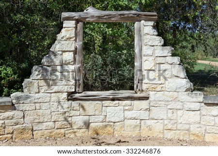 window in an old stone wall