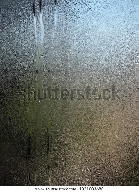 The window on wet\
ground.\
Soggy,damp,moist,soaking,sodden.
