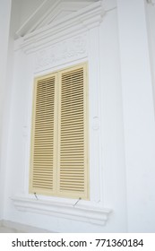 the window on the white building
