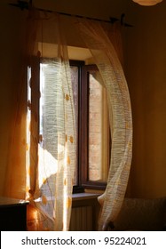 Window And Orange Curtains,air Blowing