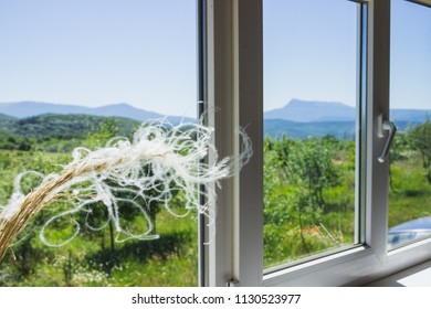  window overlooking mountains.