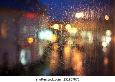 Window Rain Blurred City Lights