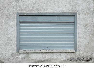 Window With Rolling Shutter, Closed Window With Aluminum Jalousie, Space For Text And For A Background, No People 