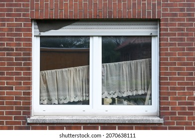 Window in a rundown house 