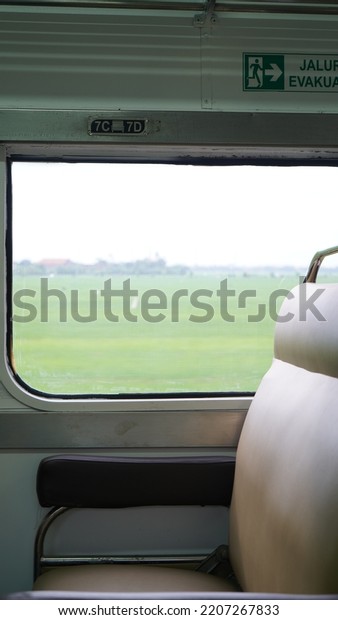 The window and seat on the\
train