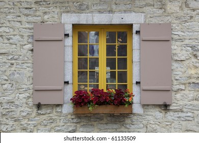 Window With Shutters And Flower Box