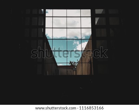 Similar – man leaning on window