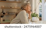 Window, smile and elderly woman with thinking at home for retirement, satisfaction and peace on weekend. Relax, senior person and calm with idea for reflection, mindfulness and good memory in house