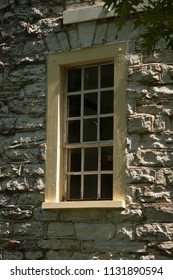 window in stone wall