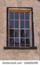 window in stone wall