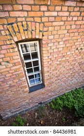 A window surrounded by bricks near Pampas Marine, Sweden