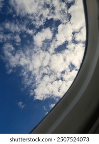 window view of clouds from airplane 