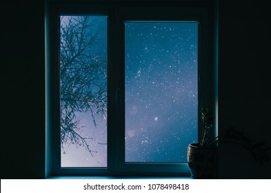 WIndow With View On Night City Sky With Stars And Tree