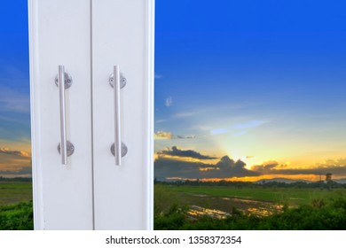 Window with a view of the sunset
