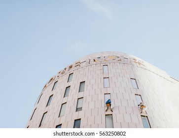 Window Washers At El Corte Ingles In Barcelona