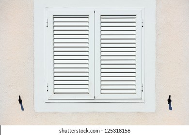 Window With White Shutters