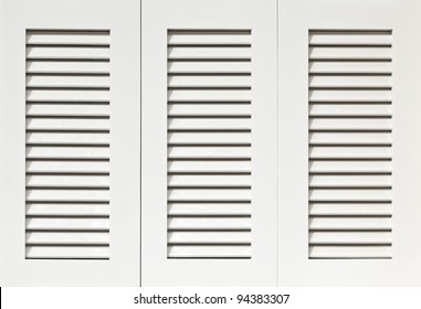 Window With White Wooden Shutters