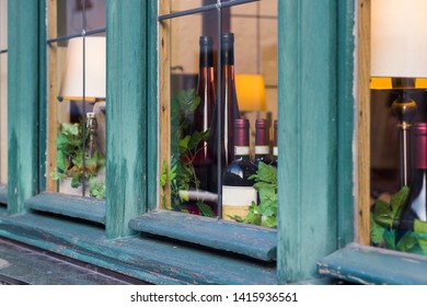 Window Of A Wine Shop With Different Wine Bottles