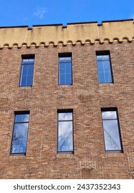 Windows of a brick-walled building