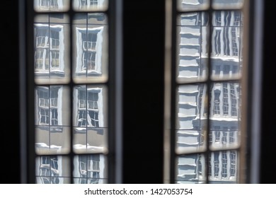 Windows of a building viewd through another window