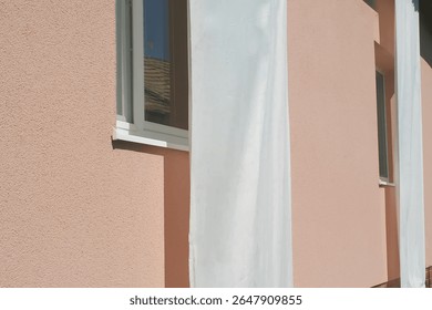 the windows are covered with tarps