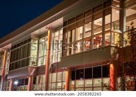 Windows of a dormitory at Indiana Tech lit up at night