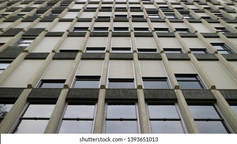 Windows Of A Grim 1960s Concrete Office Building With Brutalist Architecture