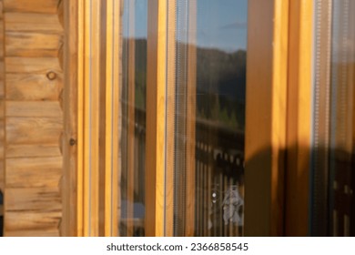Windows with high-performance frames for thermal and acoustic insulation. highlighting the double rooms between the glass.