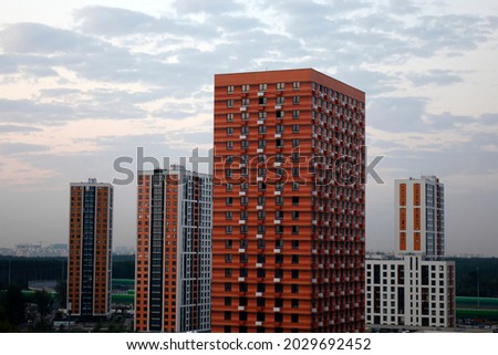 Windows of a high-rise building. High-rise buildings with apartments for residential use.