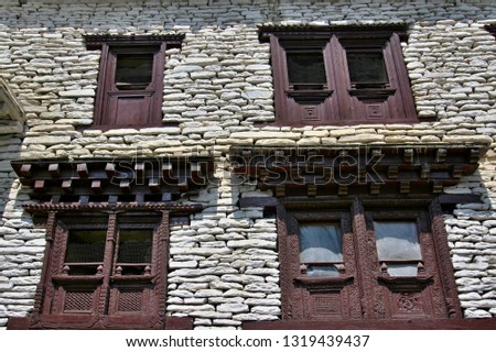 The windows of the house in Tukuche village. Around Annapurna Trek. Nepal. Asia.