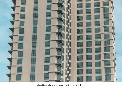 Windows in a multi-story building as an abstract background.