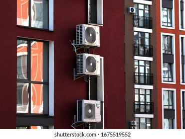 windows of a new building air conditioners
