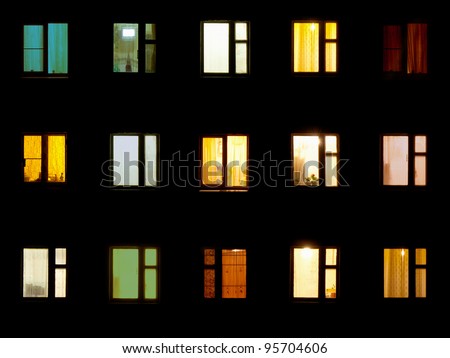 Windows at night. House building lights seamless background