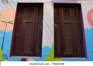 Windows on colored wall